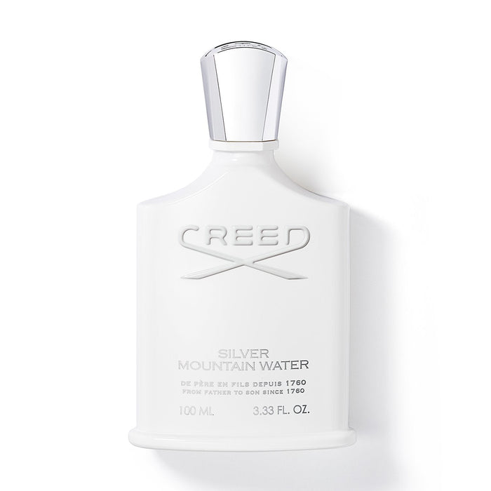 Frasco de Creed Silver Mountain Water Eau de Parfum 100 ml, diseño inspirado en las montañas.